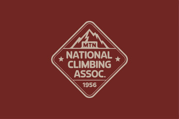 Obraz premium National climbing association vintage logo design featuring mountains and stars on burgundy background