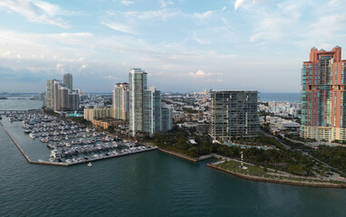 Fototapeta premium Miami Beach skyline. Sandy beaches of Miami. Seashore of Miamis famous beaches. South Pointe beach with skyscrapers. Miami city panorama. Miami skyline and ocean. South Florida. South Beach.