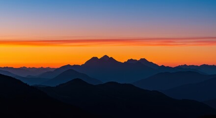 Obraz premium Mountain Range Silhouette at Colorful Sunset Sky Nature Scenery