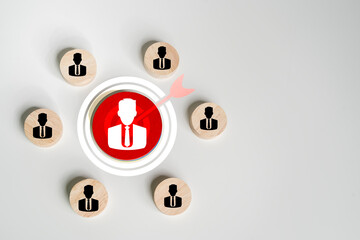Customer relationship management concept. wooden block with target icon linked.