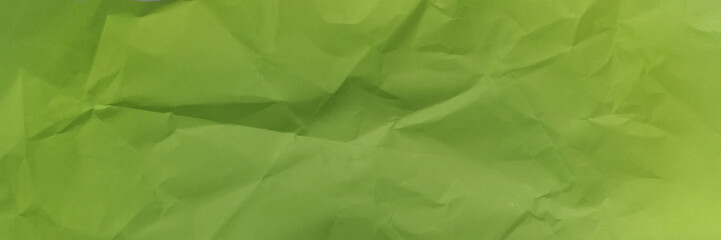 Crumpled green paper background. 