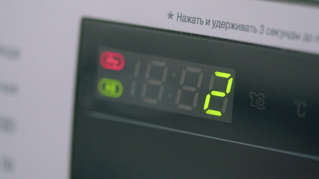 The Electronic Display Found on a Modern Appliance Featuring Adjustable Temperature Settings