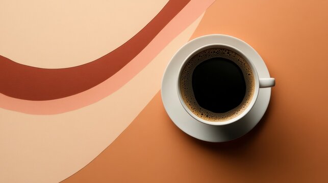 Cup of mocha coffee on wavy brown and peach table surface. Transition between two colors of year