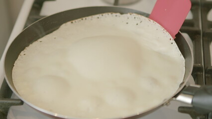 Bubbling Milk in a Pan on the Stove is an essential and delightful culinary activity