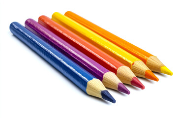 Fototapeta premium Colorful crayons arranged in rows on a white background