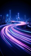 A winding highway cuts through a modern cityscape at night, illuminated by streaks of light from speeding cars
