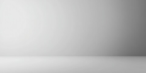Simple, clean, neutral, studio backdrop.  Empty,  light gray space,  subtle gradient