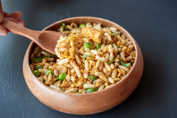 A bowl of rice with a spoon in it