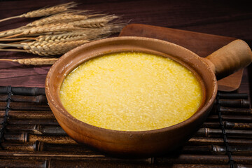 A porridge made from millet that is boiled for several hours, a common staple food in Eastern...