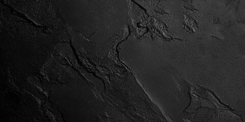 Dark black wall texture background. Black grunge background. Scratched texture on a black backdrop. Perfect for desktop wallpaper or a header image for web design.