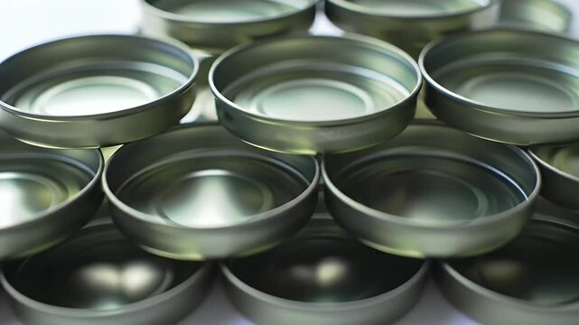 Stacked metal lids