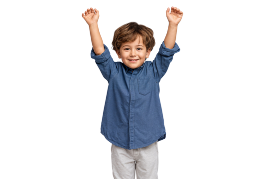 Excited young boy celebrating with arms raised up, jumping and smiling, isolated on white background