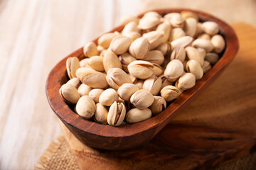 Pistachios in a bowl. Pistachios are the seeds of the Pistacia vera tree, a healthy food rich in antioxidants, vitamins, and minerals. They are consumed as a snack or as an ingredient in many recipes.