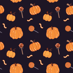seamless halloween pattern with cute pumpkins and candy