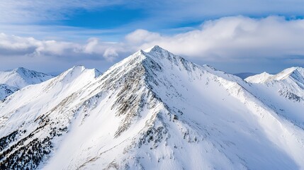 Majestic snow-capped mountain peaks amidst clouds alpine region scenic photography nature's splendor elevated viewpoint