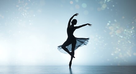 Fototapeta premium Silhouette of ballet dancer performing on stage