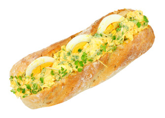 Egg mayonnaise sandwich with cress herb in a crusty bread baguette isolated on a white background