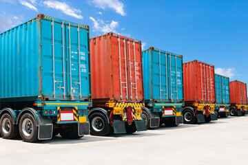 Row of Container Trailer Trucks on The Parking Lot. Big Rig. Shipping Cargo Container. Economy Business Transport on Road. Shipping Import- Export. Trucking. Freight Logistics Truck Transportation	
