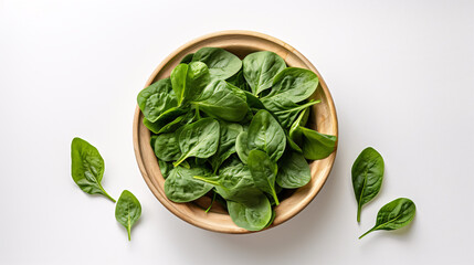 Obraz premium Hyperrealistic photo of fresh spinach leaves in a rustic wooden bowl on a clean white background.