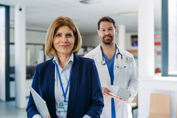 Pharmaceutical rep meeting with healthcare professional to discuss new drugs