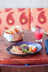 Mexican food meal with drink on rustic table vertical