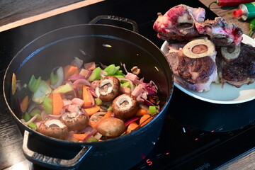 Close-Up of Sautéed Vegetables in Black Pot – Homemade Cooking Scene