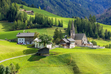 Val di Funes, Italy summer scenic view of Santa Magdalena church, idyllic Dolomites landscape in...