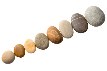 Obraz premium Smooth pebbles arranged diagonally against a solid black background for graphic design