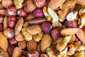 Mix of nuts as a background. Top view. 