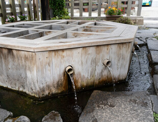 Wooden spring water well in the town of Matsumoto, Japan
