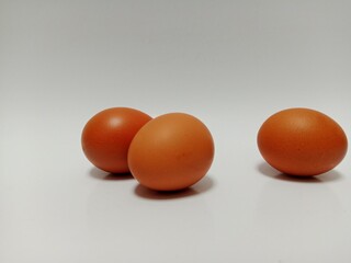 a pile of eggs with a white background