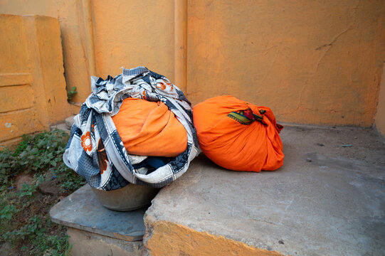 Pile of dirty clothes, washing laundry, lifestyle and culture of India, colorful clothes in a sack