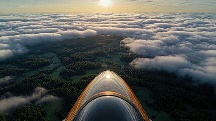 Stunning Aerial View of Clouds and Forests at Sunrise Overhead