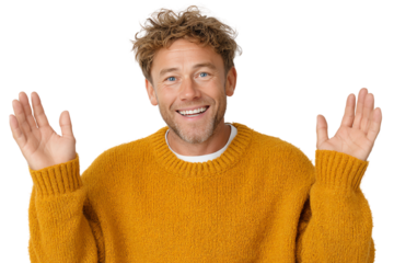 Cheerful man in a cozy orange sweater, smiling and raising hands in excitement, on a white isolated background.
