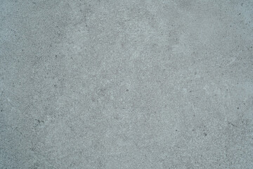 Blue toned concrete wall texture background with fine details and surface grain