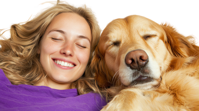 Smiling woman relaxing with her golden retriever dog, enjoying a joyful moment together.