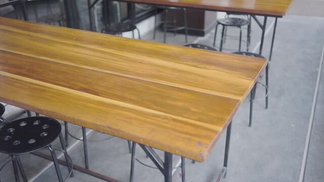 Interior wooden table and chairs in an open space