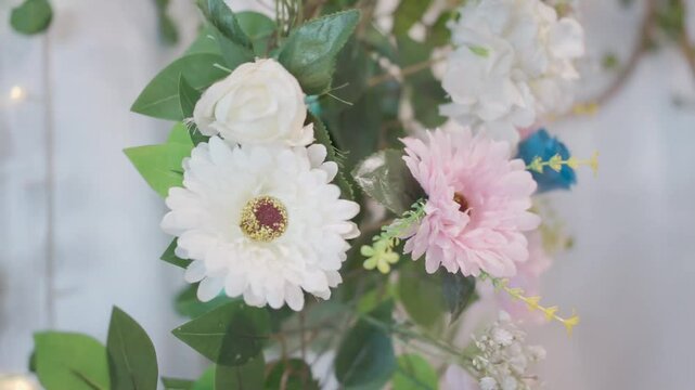white and pink roses as a wall decoration