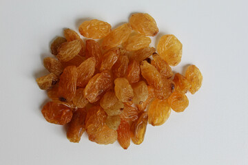 Pile of raisins, isolated on white background