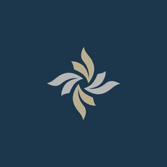A stylized floral design with a symmetrical arrangement of leaves in light gray and beige, set against a deep navy blue backdrop