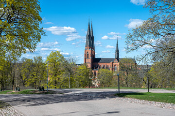 Uppsala Cathedral, the seat of the Archbishop of Sweden, on a sunny spring day in late April 2025. The cathedral was consecrated in 1435. 
