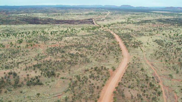 Aerial view looking east along Udoolya Road, near Alice Srings, Mparntwe. Northern Territory, Australia. August 2022.