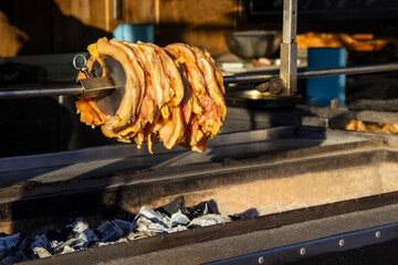 Meat is fried on grill. Street food. Close-up.