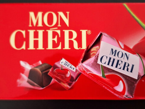 Milan, Italy-September 24, 2024:  Red box of mon cheri ferrero and candy.