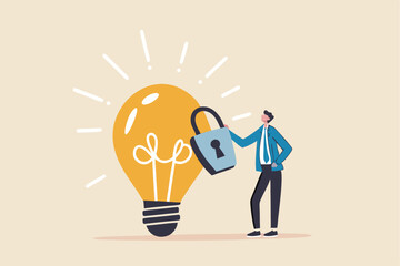 Intellectual property, patented protection, copyright reserved or product trademark that cannot copy concept, businessman owner standing with light bulb idea locked with padlock for patents.