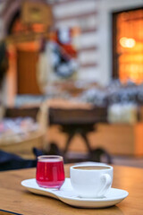 Traditional Turkish coffee and tea or chai at a restaurant in Istanbul, Turkey