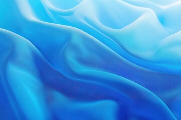 Obraz premium Soft, flowing fabric with a gradient of light to deep blue. Detailed folds and texture showcase the material's drape