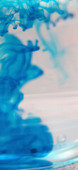 abstract image of blue droplets in water