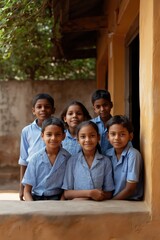A group of children are standing in front of a wall, smiling and posing for a picture. Scene is happy and friendly, as the children seem to be enjoying their time together