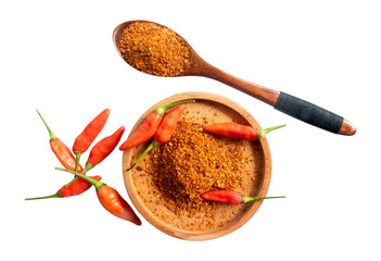red hot chili powder on a wooden bowl and wooden spoon isolated on white